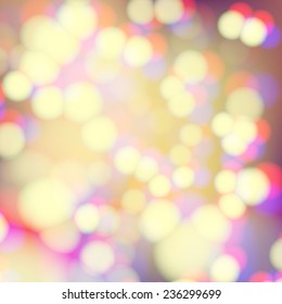 Festive background with de focused lights. Magical background with colorful bokeh. Colorful background with defocused lights