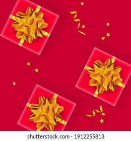 Festive background. Gift boxes with golden bows, confetti and serpentine. Top view