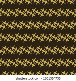 Festive background of gold stars on a black background.