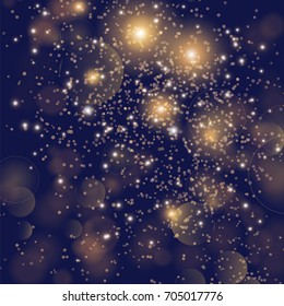 Festive background with golden sparkles and glitter , glow light effect.