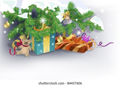 Festive background with presents and toy under Christmas tree branches.