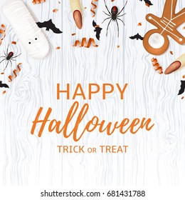 Festive background with treats for halloween. Top view on spiders, paper bats and confetti on wooden texture. Vector illustration with cookies in form of skeleton gingerbread man and serpentine.