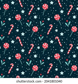 Festive background for wrapping paper. Vector seamless new year pattern. Christmas ornament with bright red candies, berries, blue stars and snow.