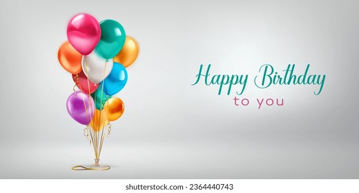 Festive birthday illustration with a bunch of colored helium balloons and inscription Happy Birthday to you on white background