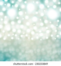 Festive blue lights Christmas background with twinkled bright background with bokeh defocused silver lights