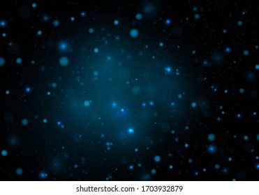 Festive blue luminous background with colorful lights bokeh. Light abstract glowing bokeh lights. Magic concept. Christmas concept.