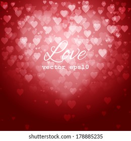 Festive blurred background with bokeh form a heart. Vector illustration, eps10.