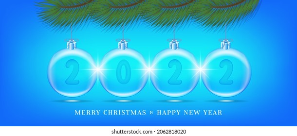 Festive bright blue banner. Transparent Christmas tree decorations with the numbers 2022. Green fir branches and the inscription Happy New Year. Radiant highlights and shadows