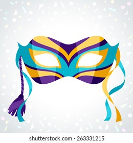 Festive carnival mask on background of confetti.