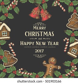 Festive Christmas background with  christmas decoration, holly leaves, gingerbreads and candies on black. Greeting inscription Happy New Year and Merry Christmas. Hand-drawn, sketch. 