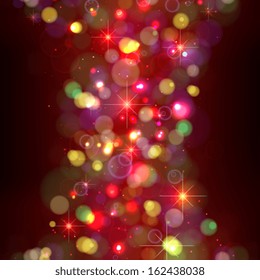 Festive Christmas background with lights. Flickering multi-colored lights on  dark background.