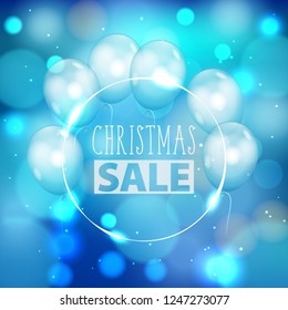 Festive Christmas blue background with defocused lights, white air balloons and thin round frame. Bokeh abstract pattern with promotion Christmas sale text
