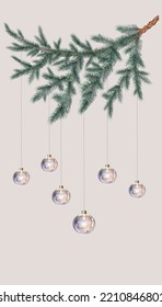 festive Christmas card with spruce branch and garland in the form of glass balls