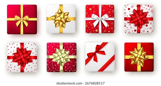 Cajas de regalo navideñas festivas envueltas en papel rojo, blanco y dorado.