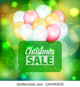 Festive Christmas green background with defocused lights, white, red and yellow air balloons and rectangle frame with text. Bokeh abstract pattern with promotion Christmas sale text