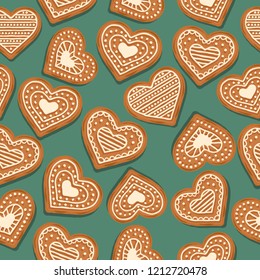 Festive Christmas seamless pattern with gingerbread hearts on green background. Vector