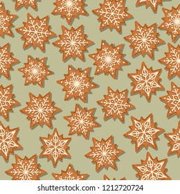 Festive Christmas seamless pattern with gingerbread stars on green background. Vector