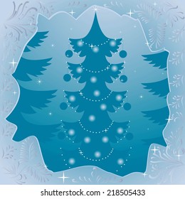 A festive Christmas tree,frosty patterns on the glass