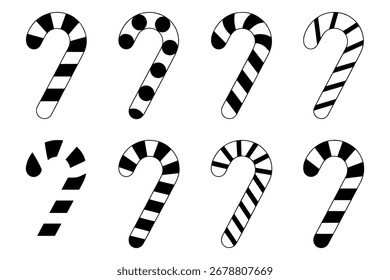 festive collection of candy canes with black and white stripes