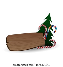 Festive composition with Christmas tree, sweets and the wooden board on a white background.