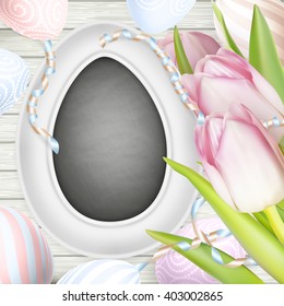 Festive composition with pink tulips, chalk board and eggs on wooden background. EPS 10 vector file included