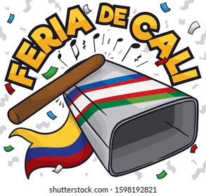 Festive design with metallic cowbell under a confetti shower, decorated with the Cali city flag and ribbon with Colombian colors for Feria de Cali celebration (written in Spanish).