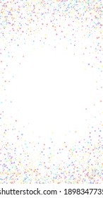 Festive elegant confetti. Celebration stars. Colorful stars small on white background. Fetching festive overlay template. Vertical vector background.