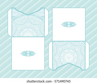 A festive envelope, box, cover for wedding, party, congratulations, I'm sorry. Laser cut mandala, Oriental motif hand-painted background. Decorative elements for design print. Vector EPS 10