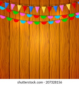 Festive flags on a wooden background. Vector illustration.