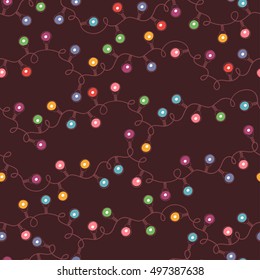 Festive garlands with multicolored lights. Vector seamless pattern.