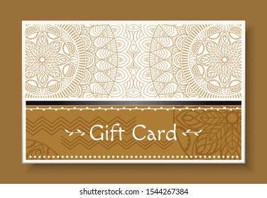 Festive gift card with mandala isolated on brown. Greeting postcard with repeated decorative design, geometric waves on paper. Template of shopping certificate. Vector illustration in flat style
