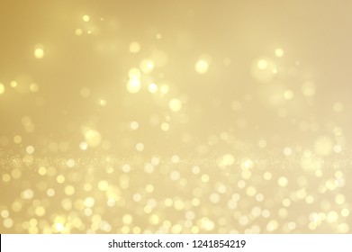 Festive glowing golden light effect, sparkling glittering decorative background