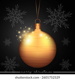 A festive golden Christmas ball adorned with stripes on a black snowflake background.