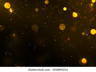 Festive golden luminous background with colorful lights bokeh. Sparkling magical dust particles. The dust sparks and golden stars shine with special light on a black background. Christmas concept.