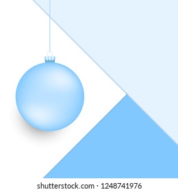 Festive holiday background with blue papers and hanging light blue christmas ball in ice colors.