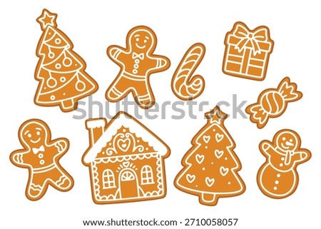 Festive holiday biscuits collection. Glazed gingerbread cookies shaped like Christmas trees, gingerbread men, gift box, snowman and candy cane.