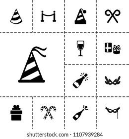 Festive icon. collection of 13 festive filled icons such as opened champagne, party hat, gift, candy cane, mask, wine glass. editable festive icons for web and mobile.
