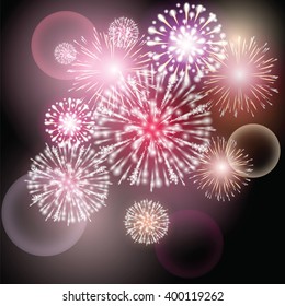 Festive light fireworks in on dark night background with lights