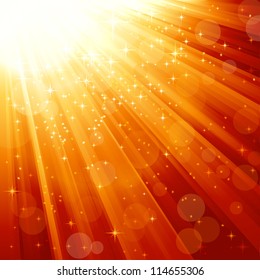 Festive light ray background in reds and gold. Stars and blurry light dots give it a festive and magical feeling. Perfect for the Christmas season.