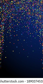 Festive neat confetti. Celebration stars. Rainbow confetti on dark blue background. Glamorous festive overlay template. Vertical vector background.