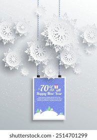 A festive New Year sale advertisement with 70 percent discount offer. White snowflakes hang against a snowy background with a blue, snowy landscape card. Ideal for holiday promotions, winter sales