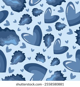 festive pattern for St. Valentine's Day from blue hearts and blue petals from iris flowers on a blue background