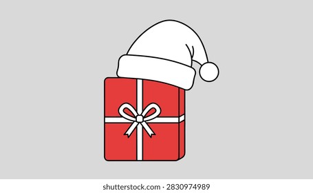 Festive red present box tied with a white ribbon bow has a Santa hat sitting on top to represent a holiday gift for a christmas party event.