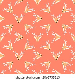 Festive seamless Christmas pattern with heads of reindeers and ornaments. Vector illustration 