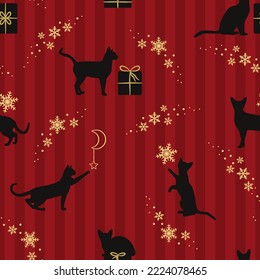 Festive seamless pattern. Cats playing with stars, gifts and snowflakes. Magical Christmas scene. Vector illustration on a red striped background with golden elements.