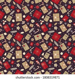 Festive seamless pattern with Christmas gifts, candies and Christmas decorations on a dark background with snowflakes.