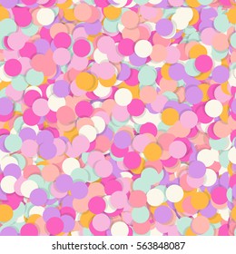 Festive seamless pattern with confectionery sprinkling. Random mess repeated texture of pink, yellow, purple color. Bright and colorful vector background