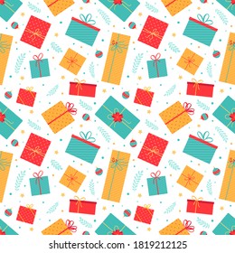 Festive seamless pattern with multicolored Christmas gifts and Christmas decor.