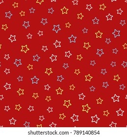 Festive seamless pattern with scattered outlines of stars. Cute colorful vector illustration.