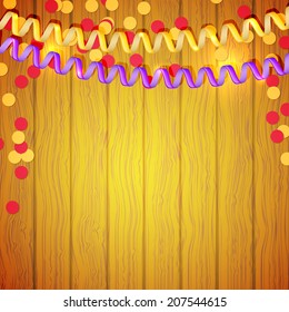 Festive serpentine and confetti on a wooden background. Vector illustration.